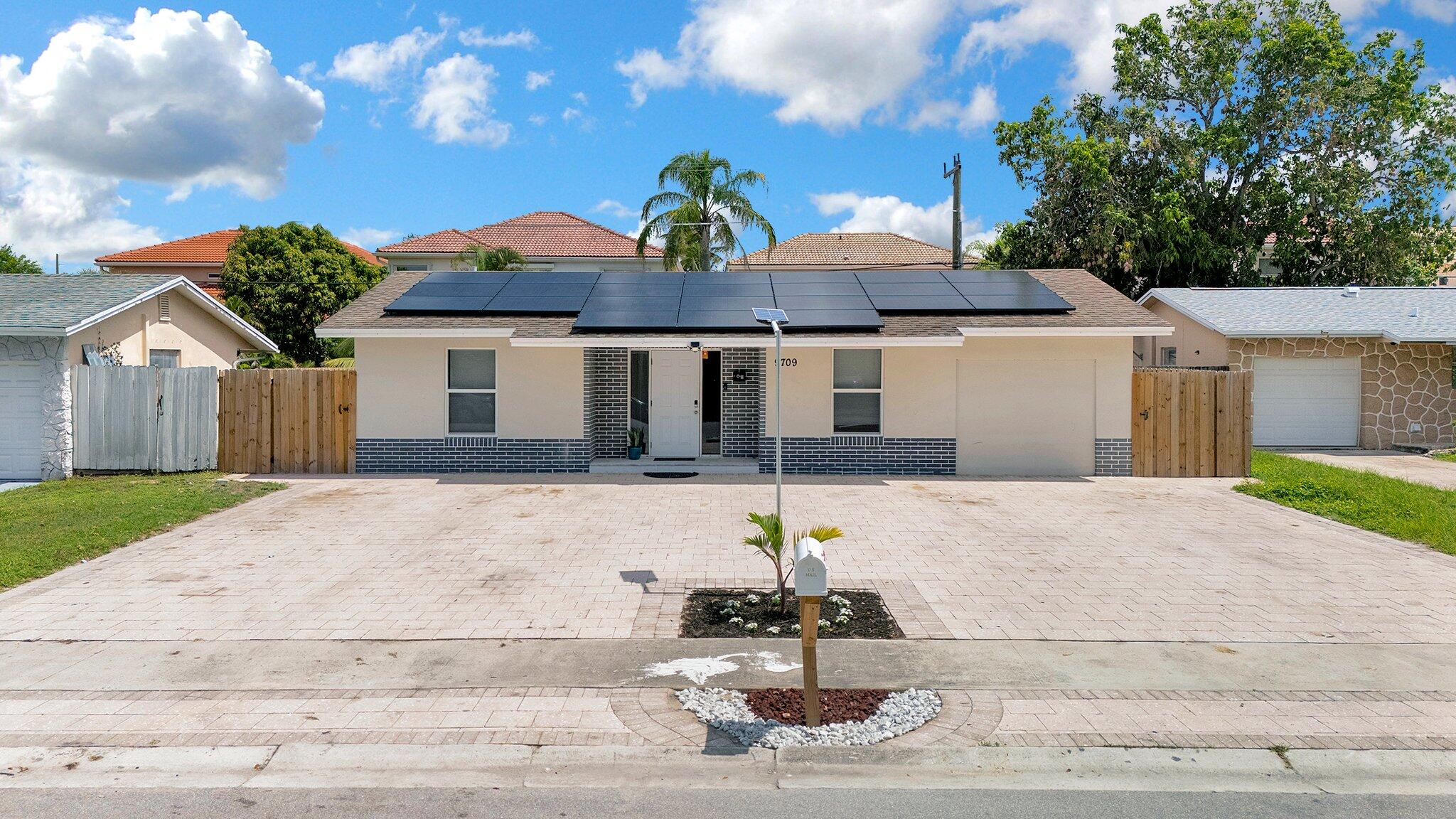 3BR – SingleFamilyResidence at 9709 SW 1st Place