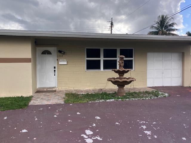4BR – SingleFamilyResidence at 6760 NW 25 Court