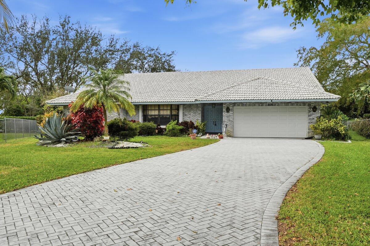 4BR – SingleFamilyResidence at 8870 NW 49th Drive