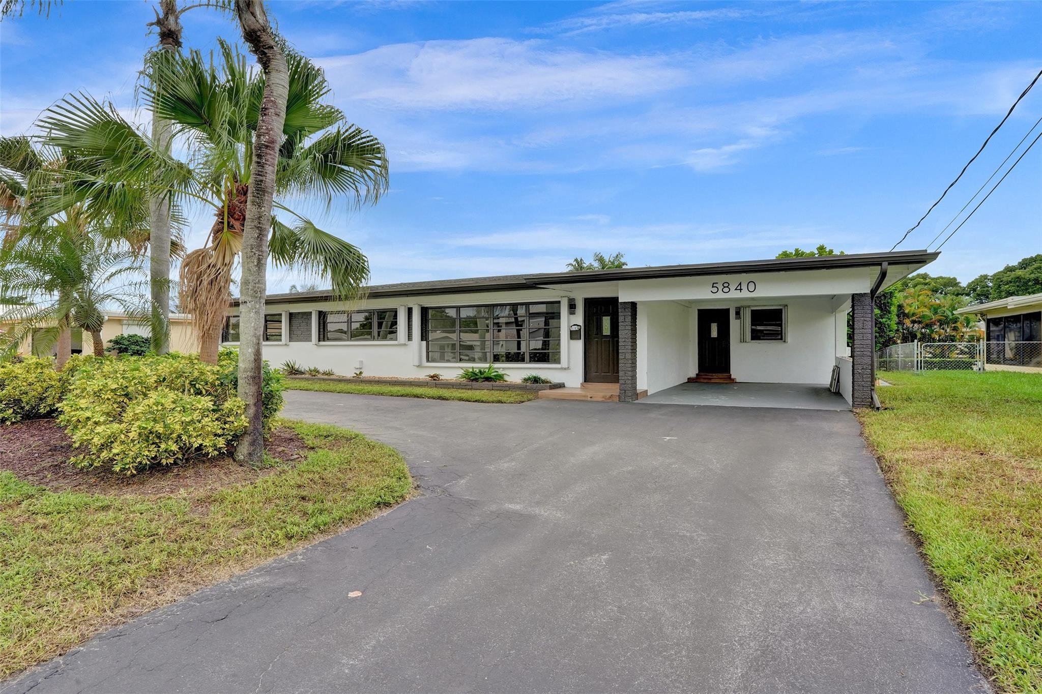4BR – SingleFamilyResidence at 5840 SW 14th Street