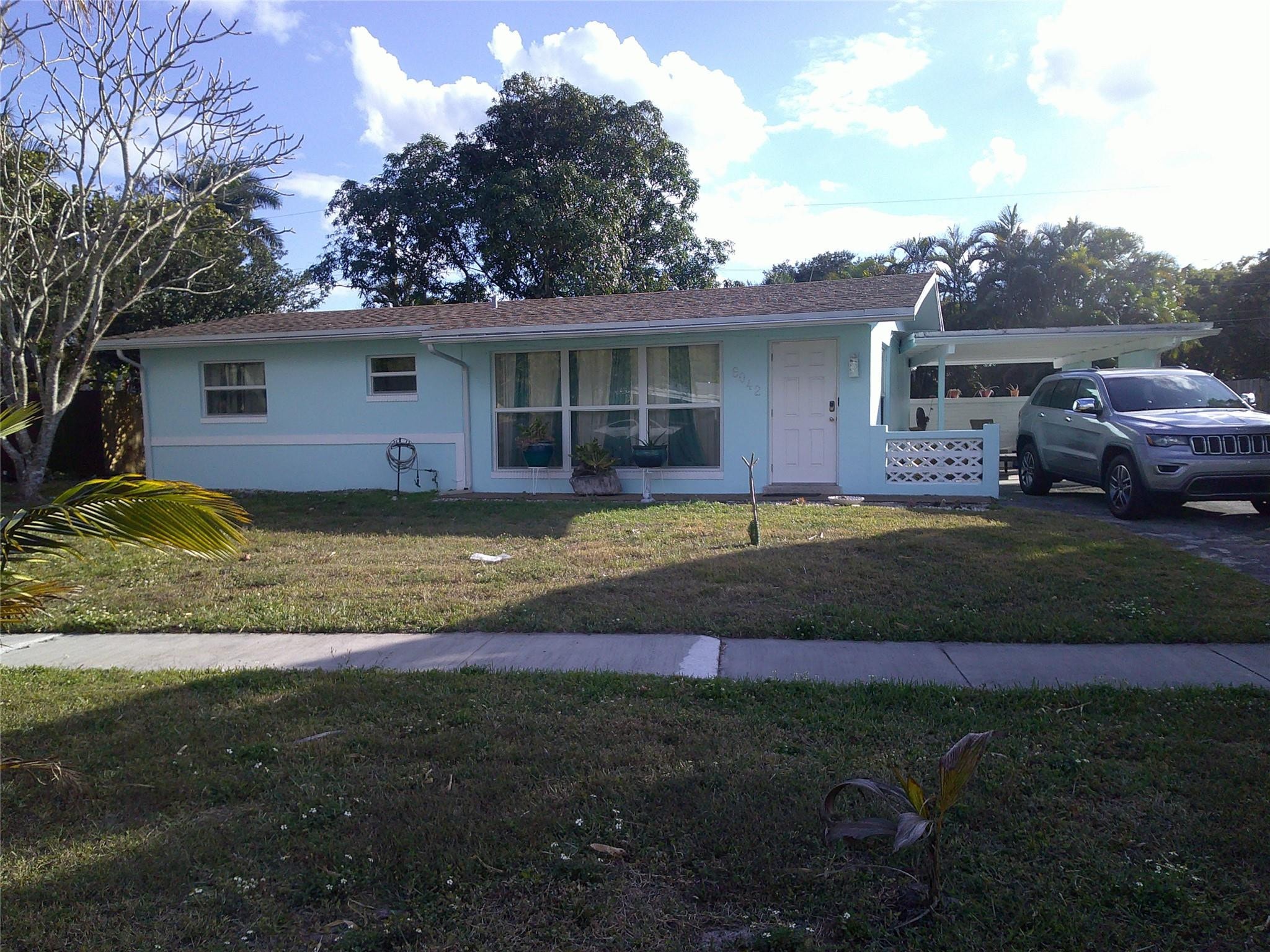 2BR – SingleFamilyResidence at 6042 NW 18th Street