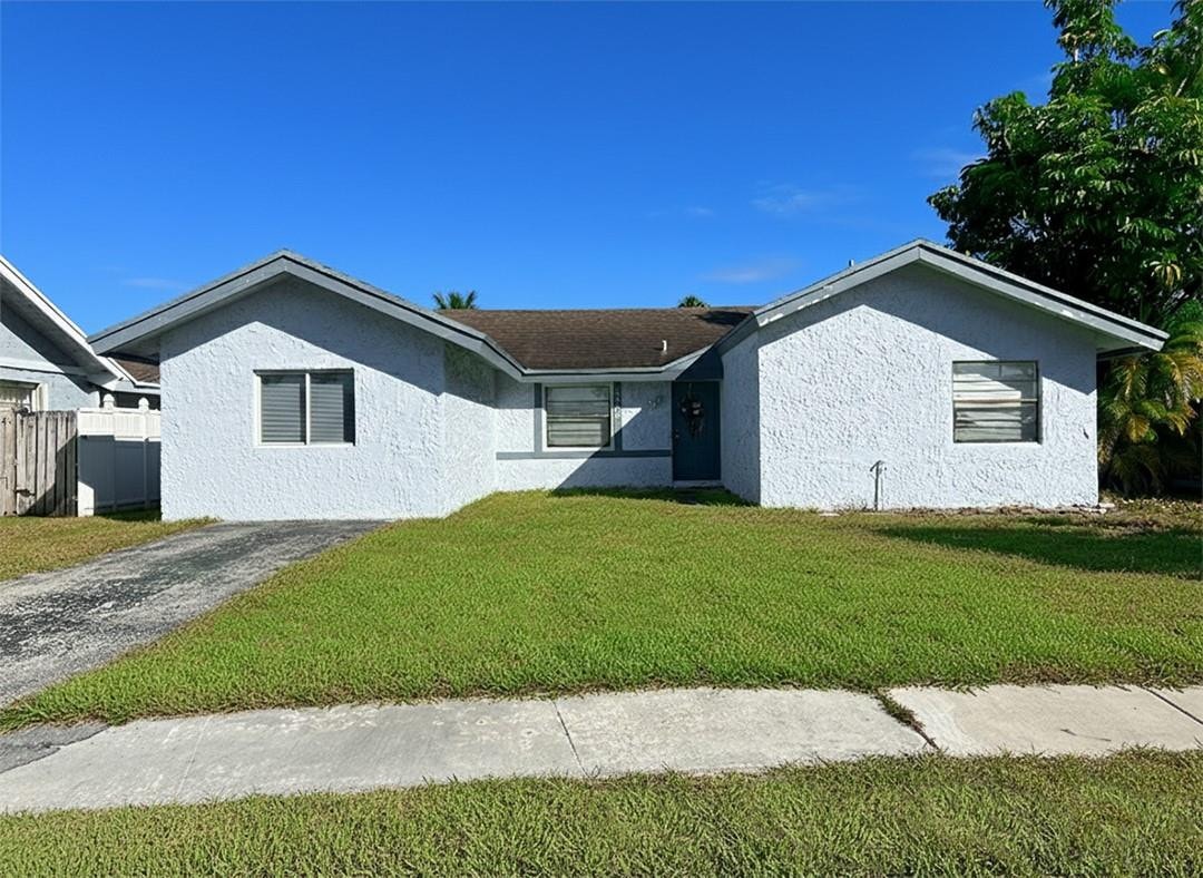 3BR – SingleFamilyResidence at 8205 SW 12th Place