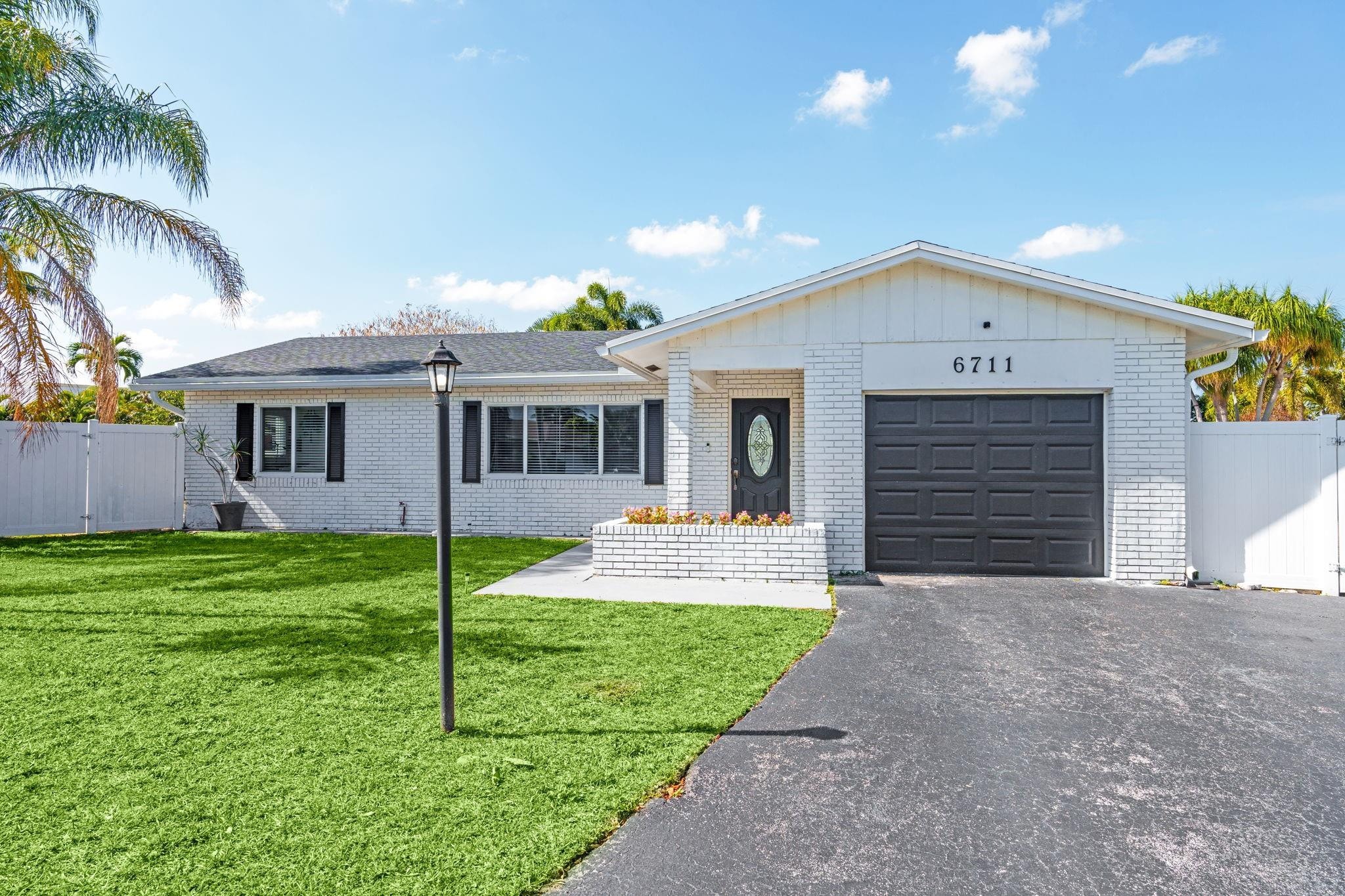 3BR – SingleFamilyResidence at 6711 NW 28th Avenue