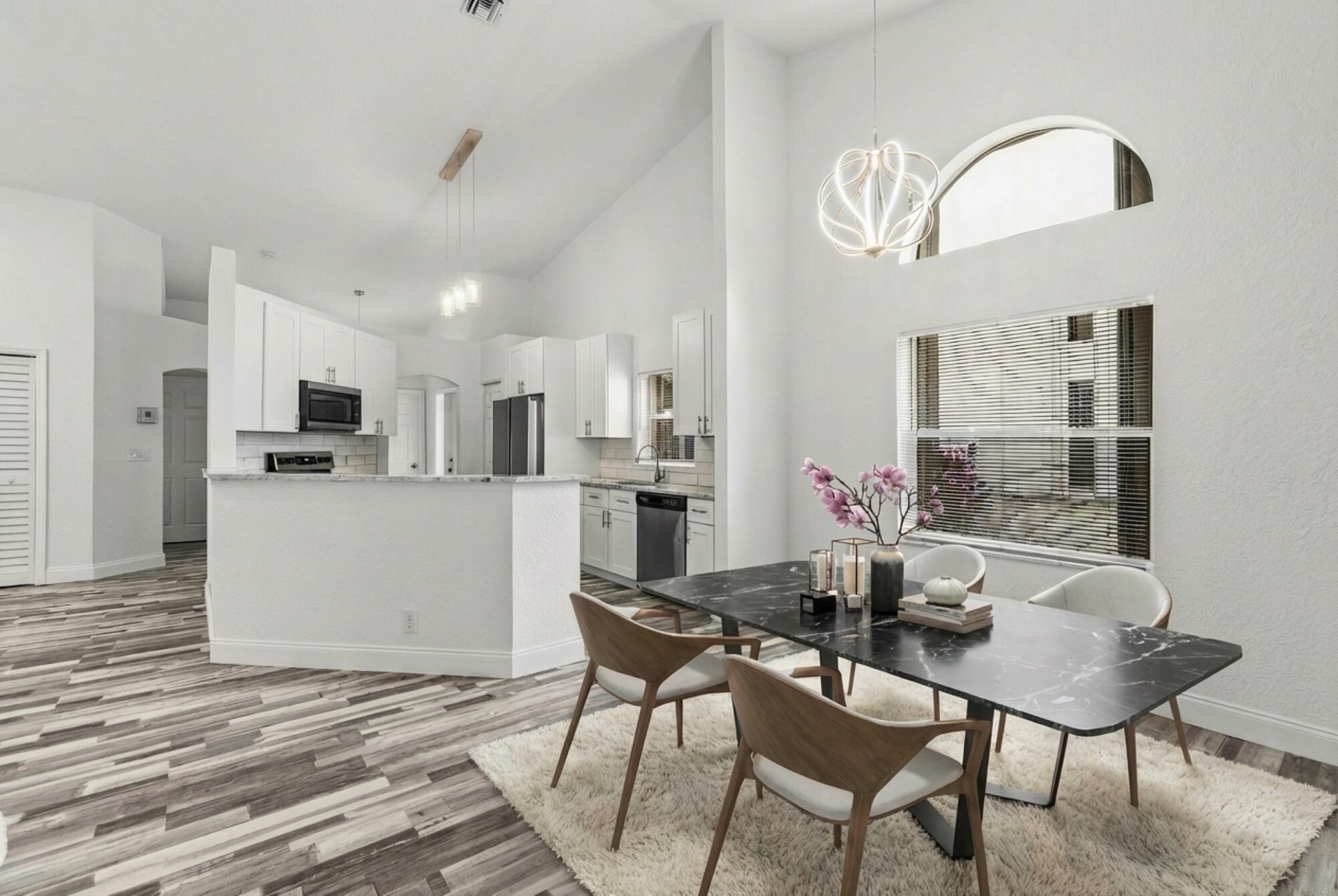 2BR – RES at 15465 Lake Gardenia Place