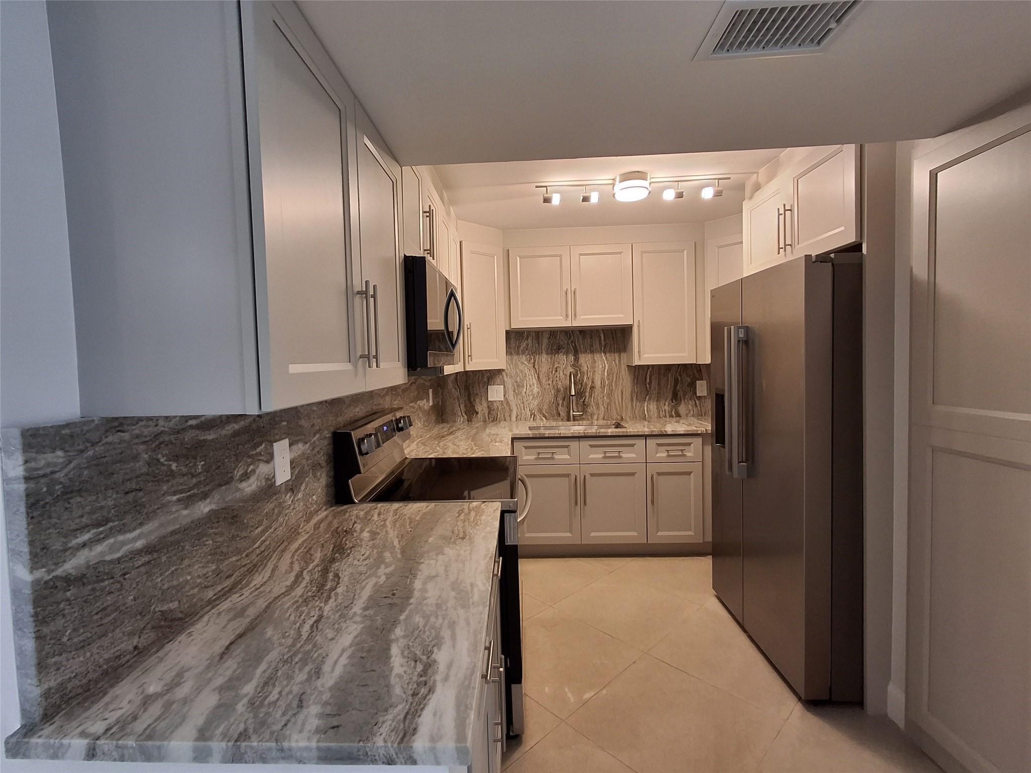 3BR – Condominium at 8763 Shadow Wood Boulevard #202