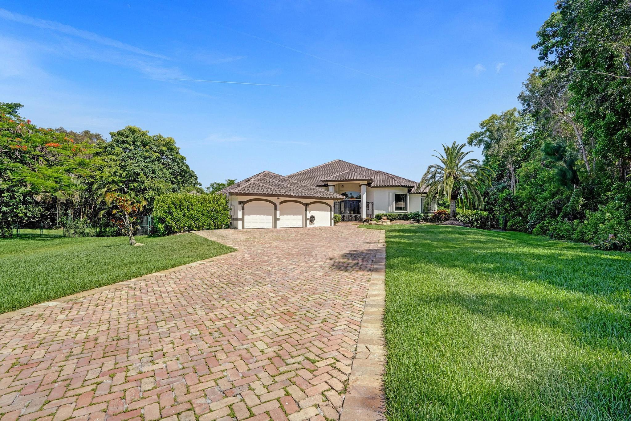 5BR – SingleFamilyResidence at 11720 NW 9th Street