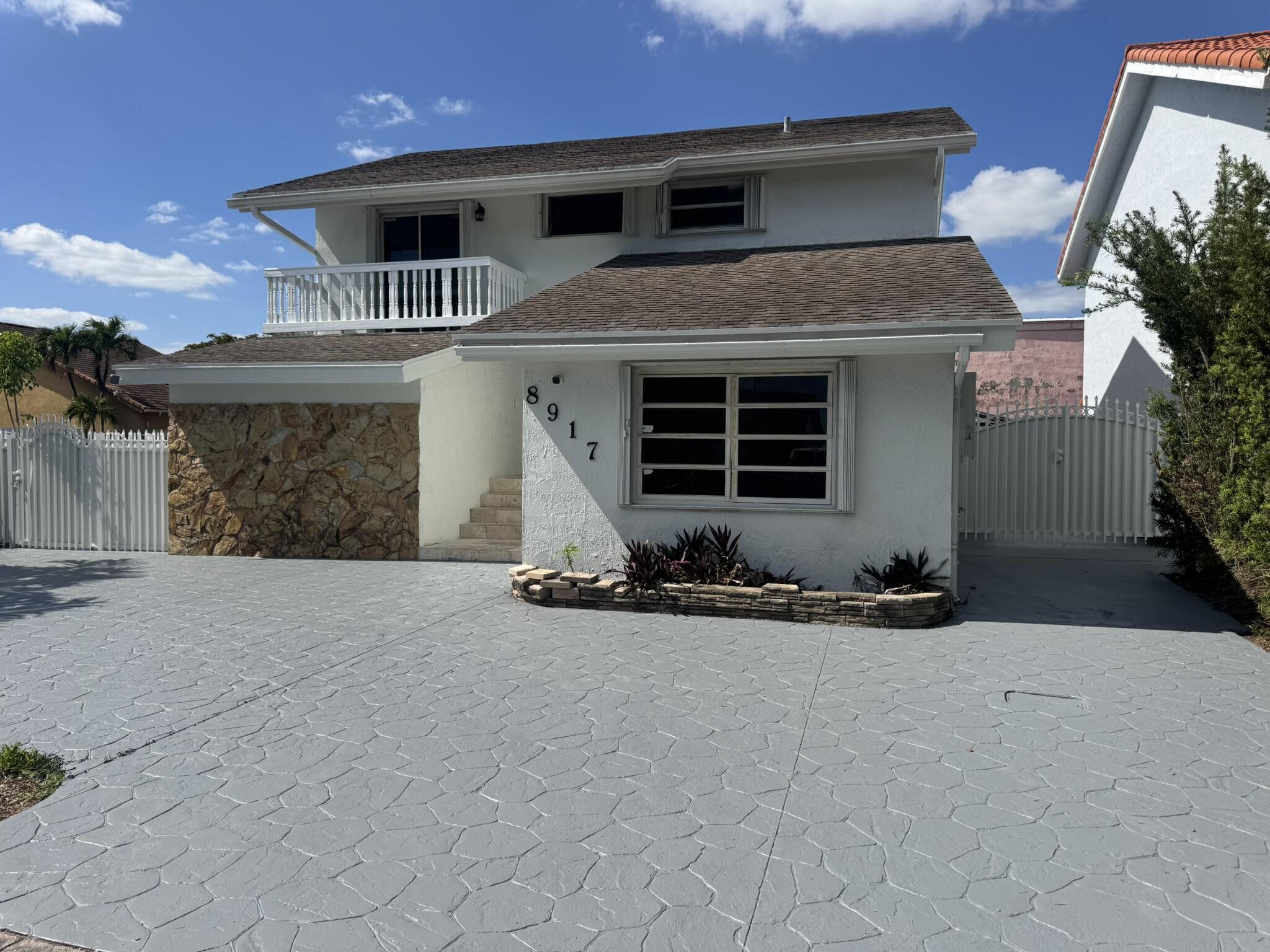 4BR – SingleFamilyResidence at 8917 SW Grand Canal Drive