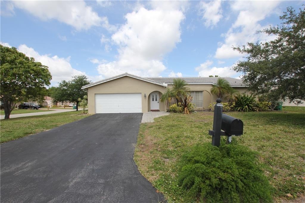 4BR – SingleFamilyResidence at 1122 NW 82nd Avenue