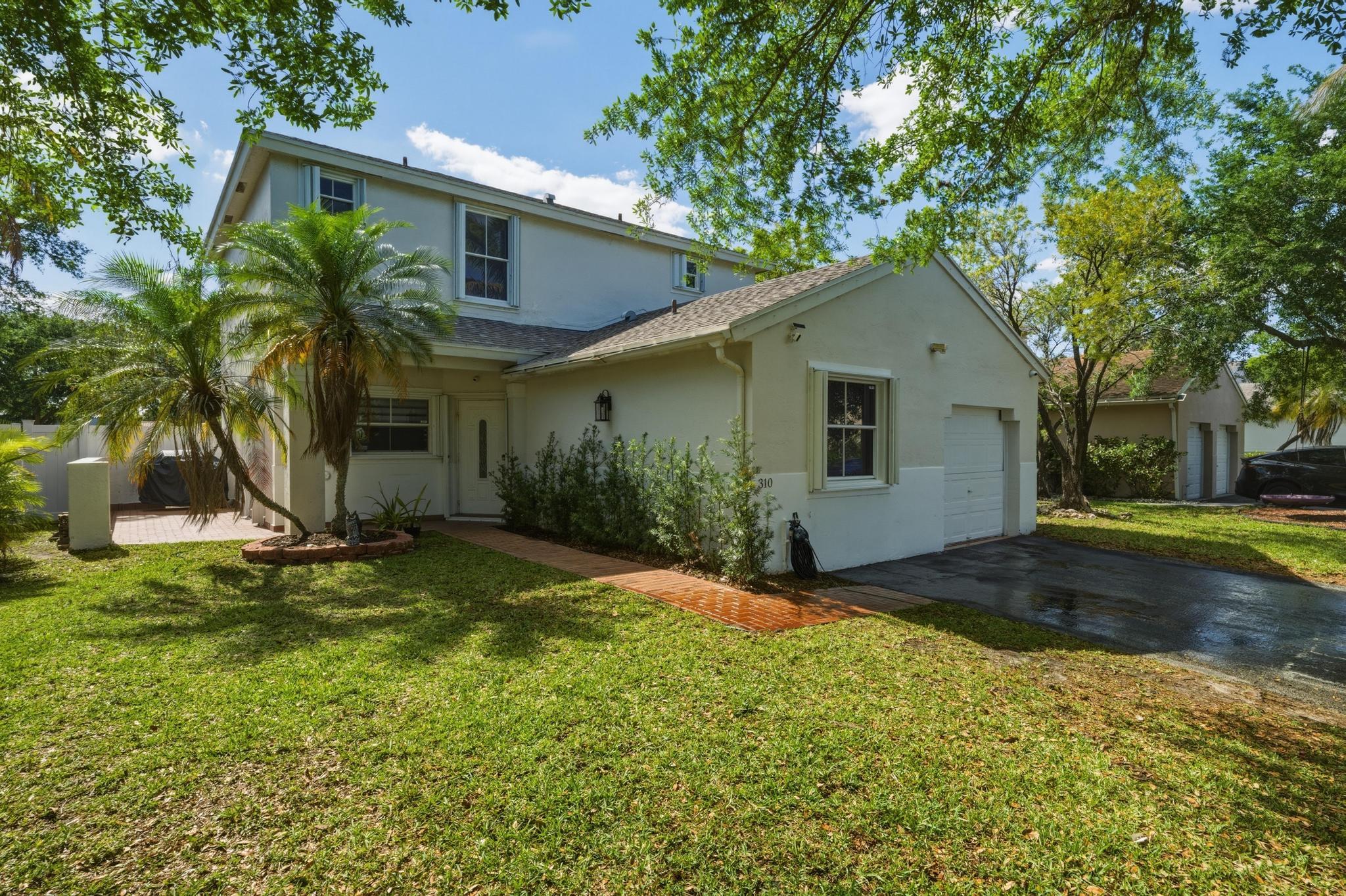 4BR – SingleFamilyResidence at 310 NW 207th Way
