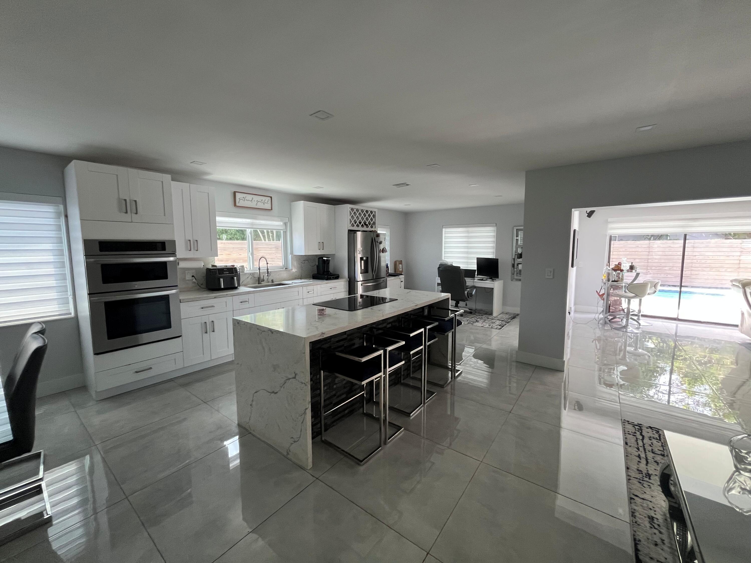 4BR – SingleFamilyResidence at 6800 SW 7th Place